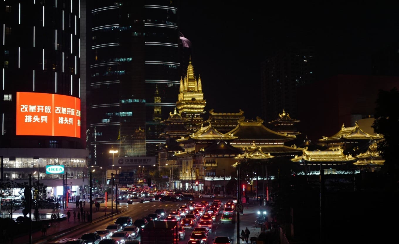 Long exposure shot of car light trails on the road near Jing'an Temple