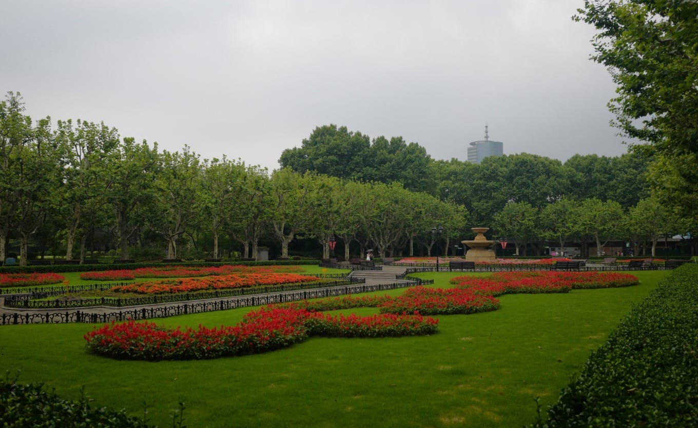 Another peaceful view of pathways and trees in the blended-style Fuxing Park