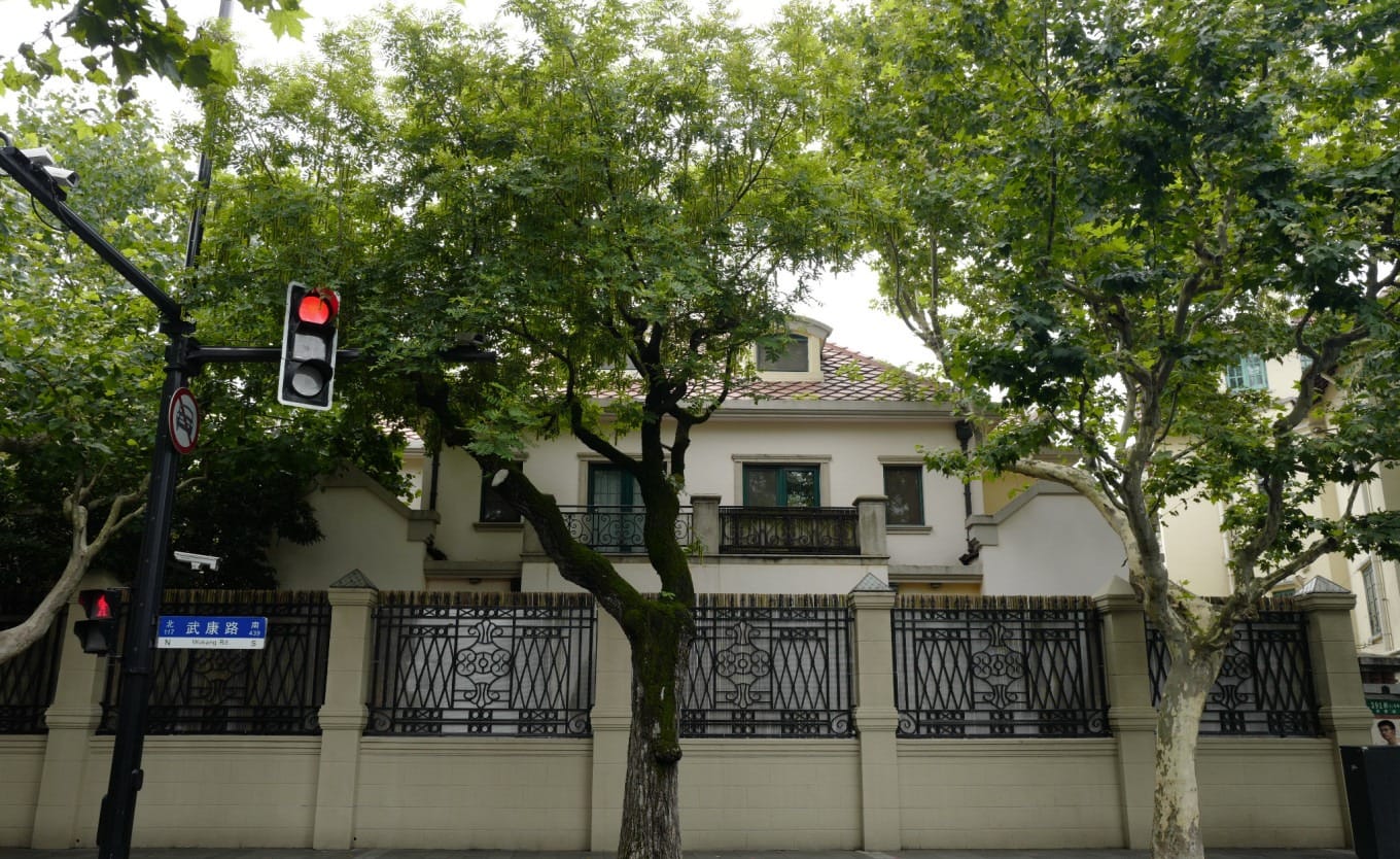 Courtyard view within the Wukang Court complex, showing a mix of old and new architecture