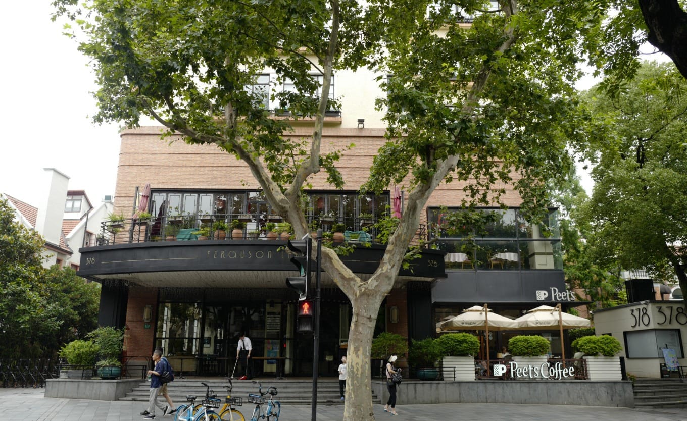 The red-brick former diplomat's mansion at the front of Wukang Court