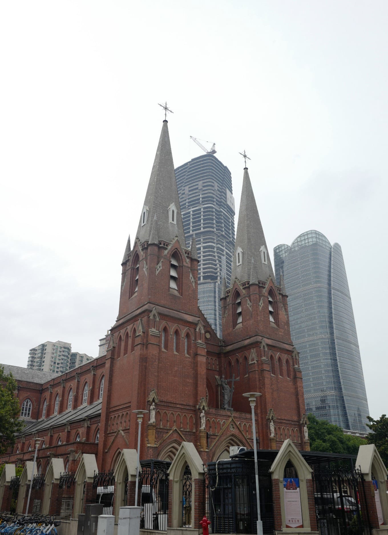 View framing the historic cathedral with new skyscrapers in the background