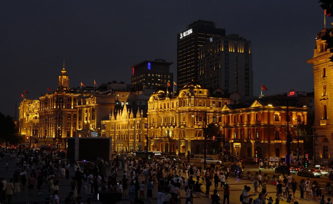Panoramic night view showing both The Bund buildings and Pudong skyline