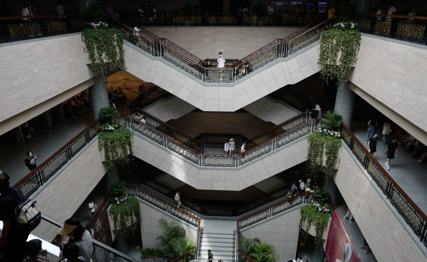 Visitors exploring an exhibition hall inside the Shanghai Museum