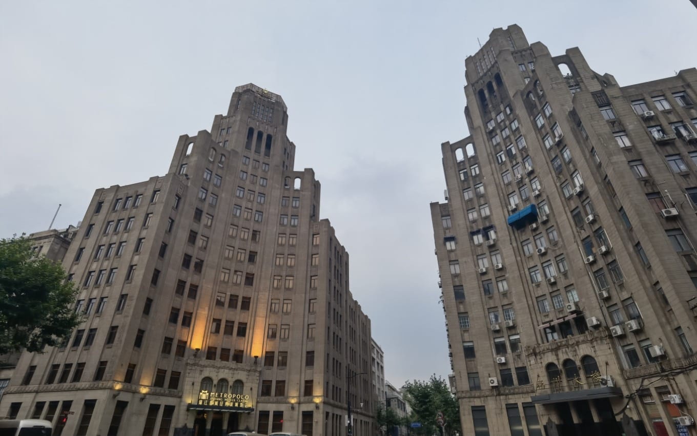 Intersection view showing Fuzhou Building and Jin Jiang Metropolo Hotel facing each other