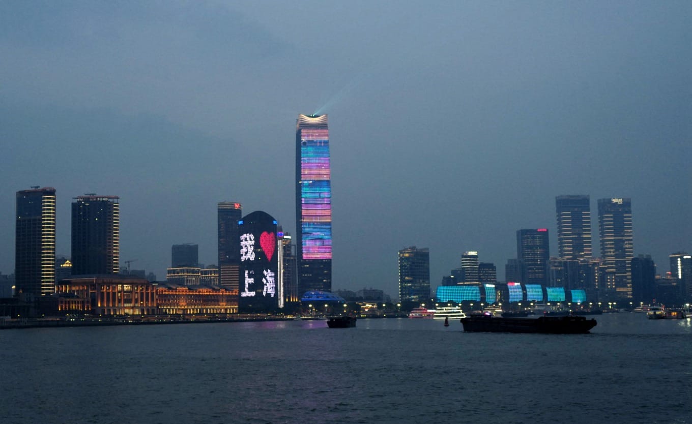 Close-up view of 'I Love Shanghai' light projection on Pudong buildings