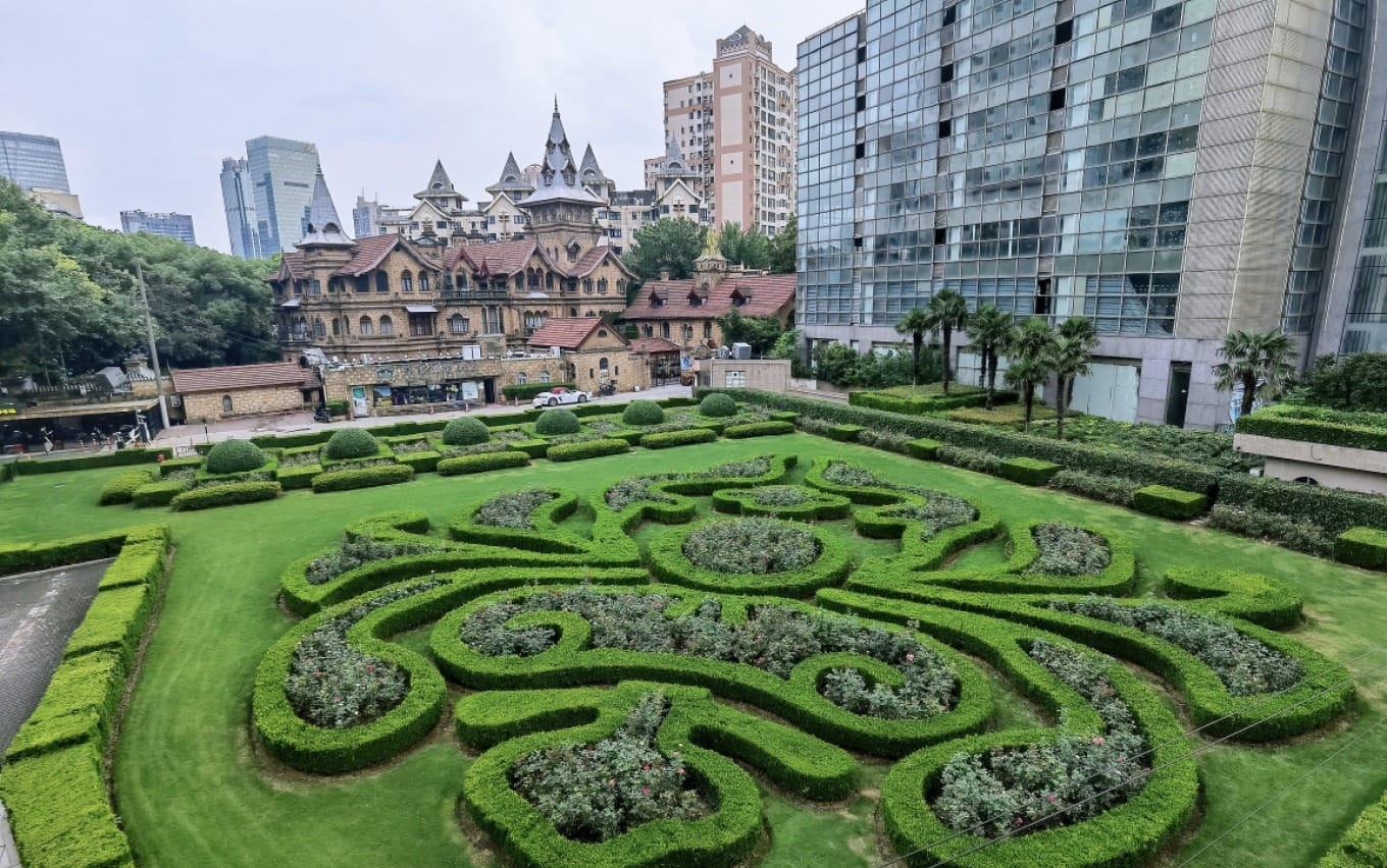 A vibrant night scene in Shanghai with neon lights illuminating streets and buildings