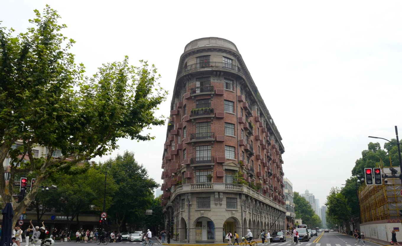 The full facade of the historic Wukang Building from across the street