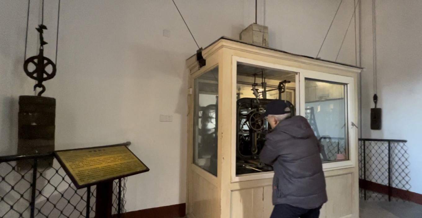 Caretaker adjusting the church clock