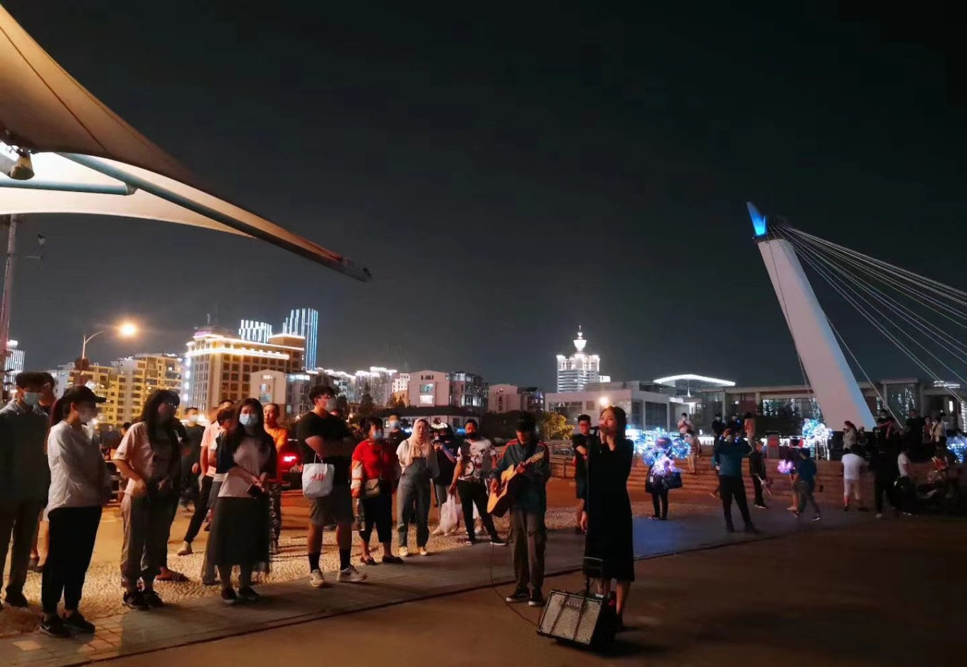 People singing at May Fourth Square