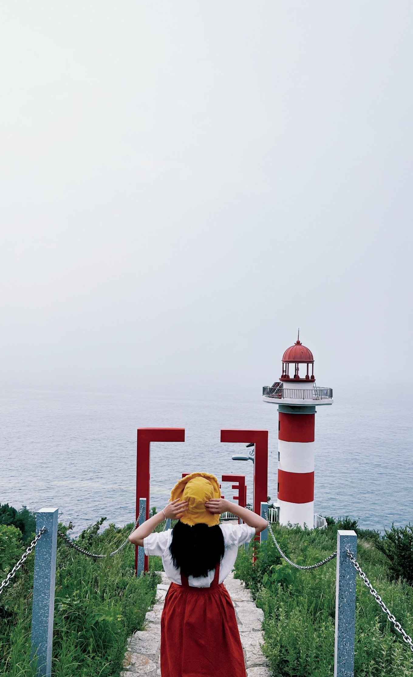 Lingshan Island coastline with turquoise water and green hills