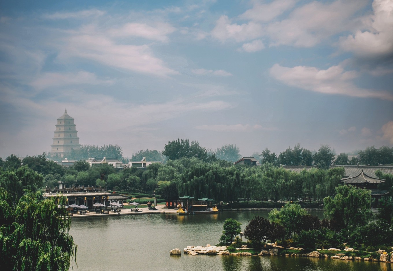 Reflection of Tang-style buildings in the lake at Tang Paradise