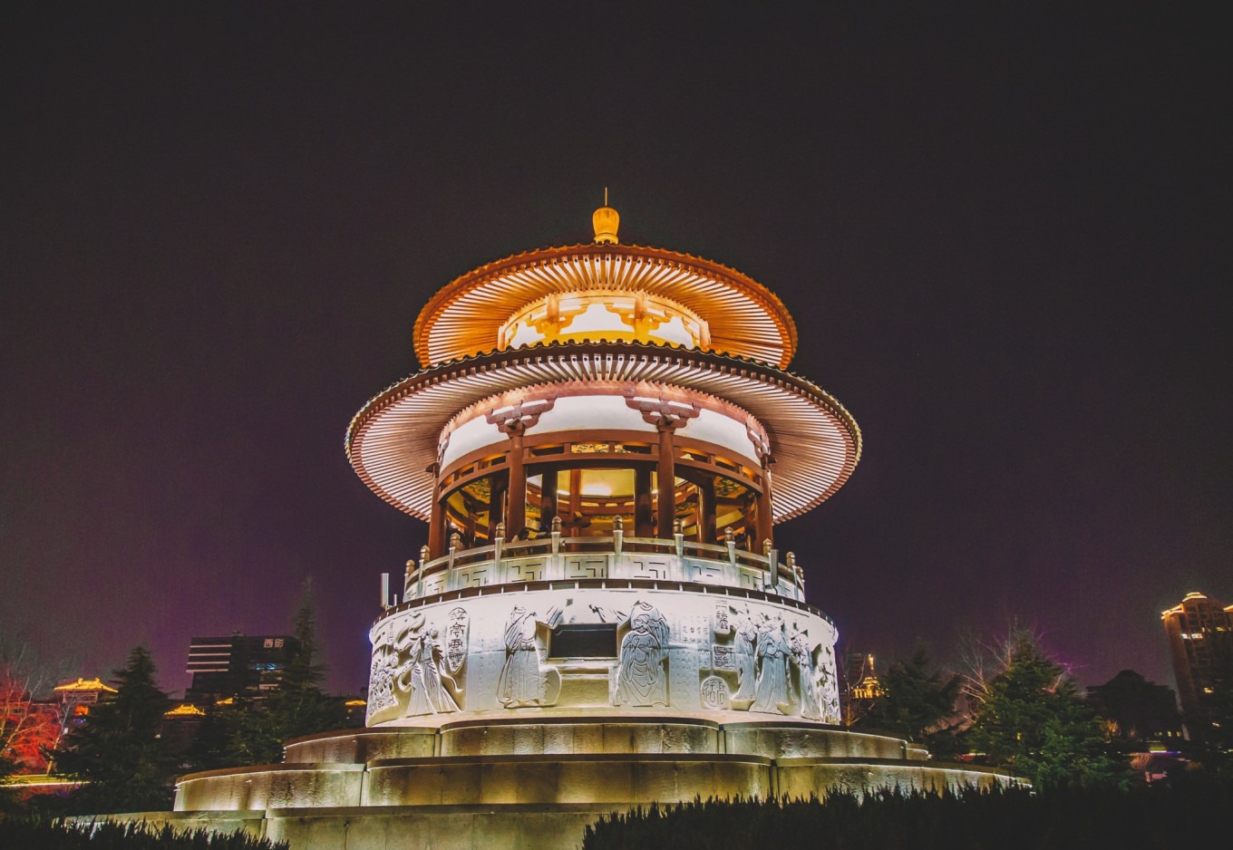 Evening view of Tang Paradise with lanterns and reflections