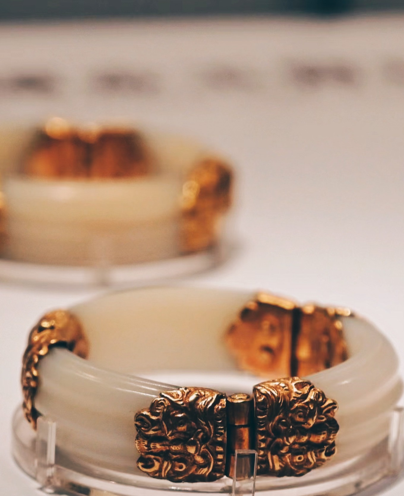 Tang dynasty gold and jade armbands with gemstone inlay