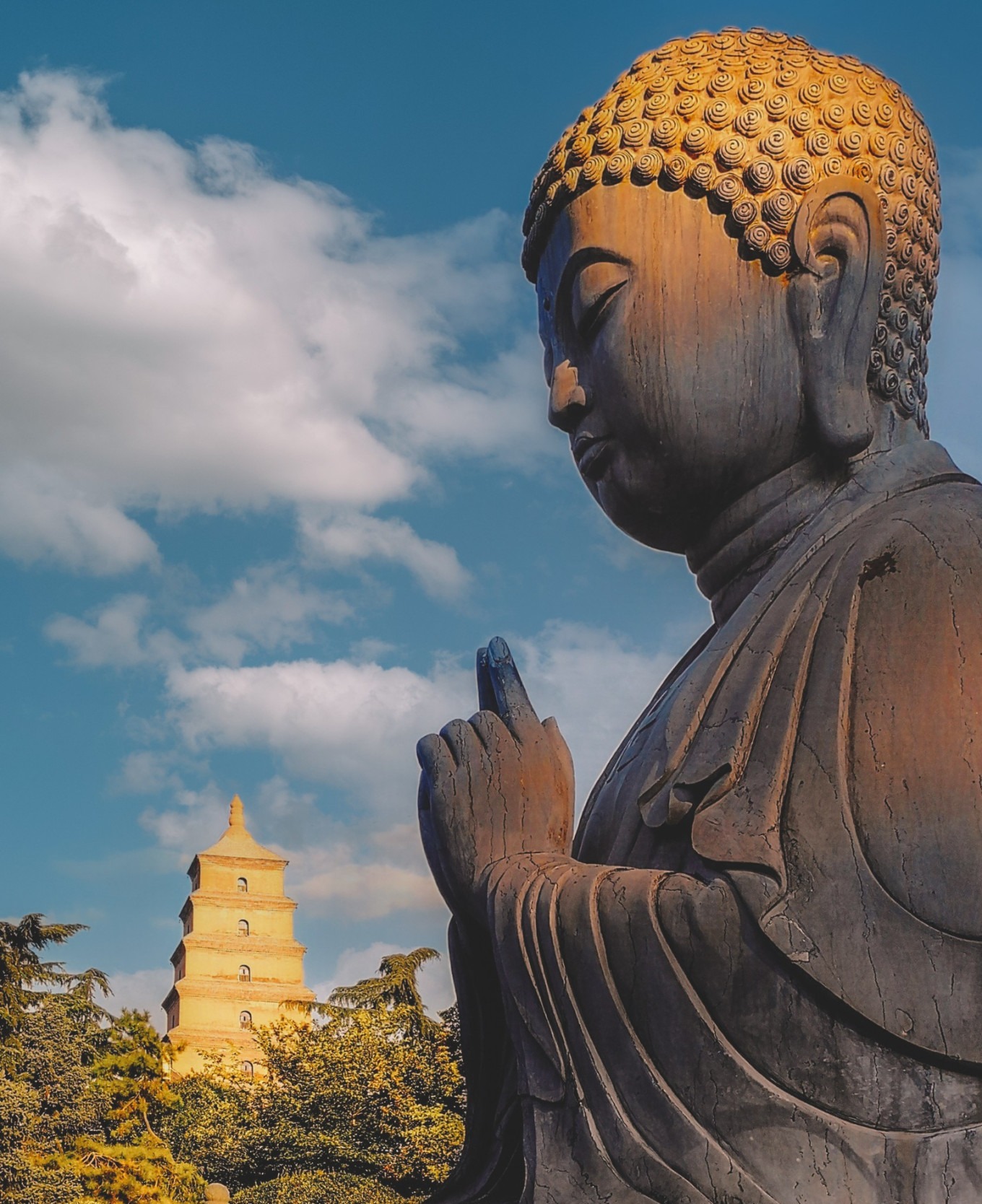 Big Wild Goose Pagoda at sunset with golden light illuminating the ancient brick structure