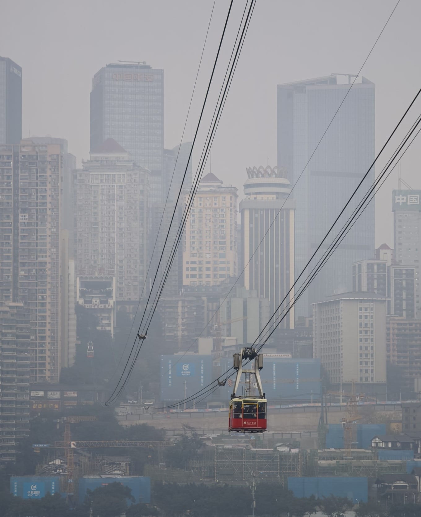 View from Skywalk observation deck showing Chongqing's high-rise buildings