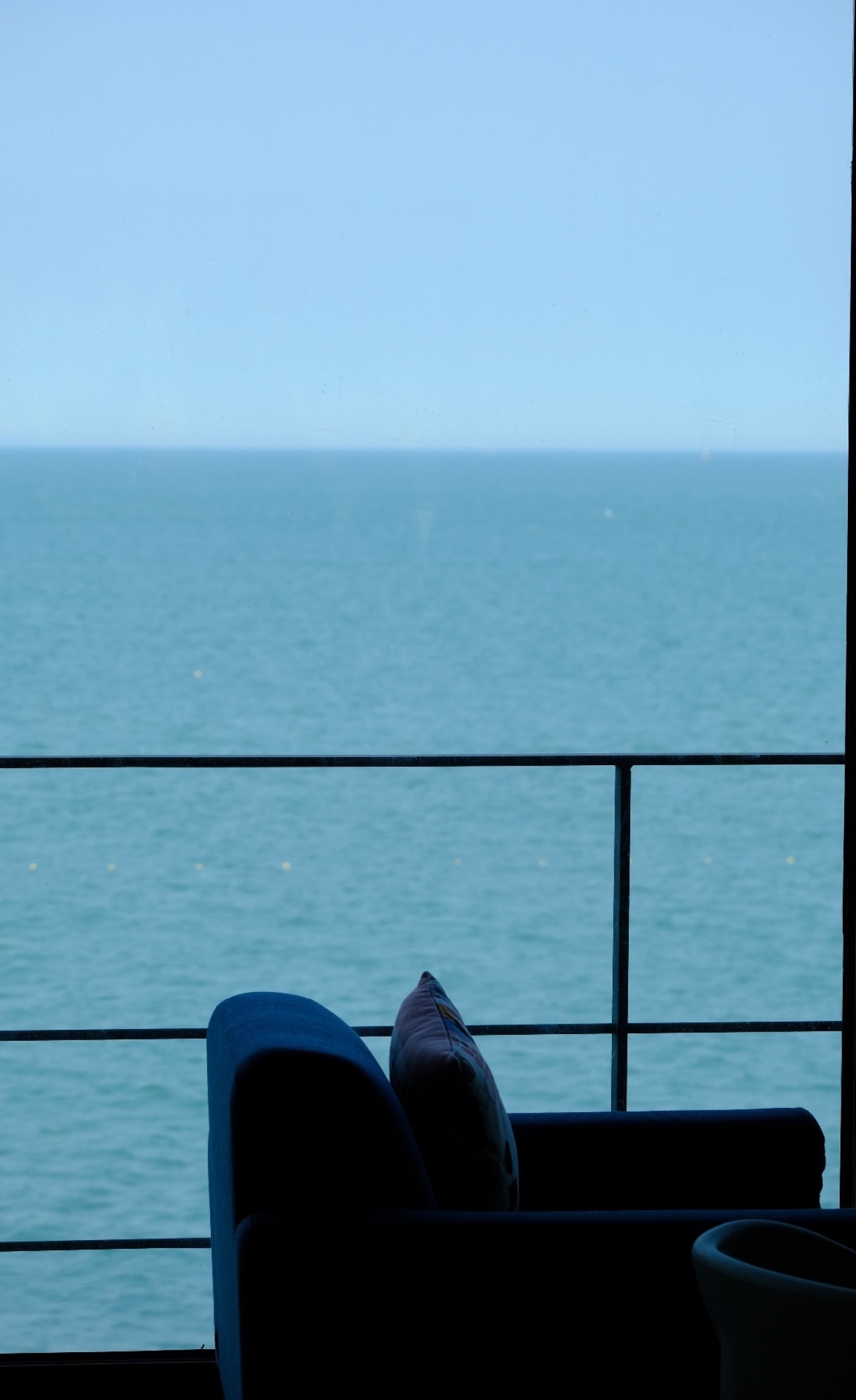 Interior of a seaside café with ocean view in Laoshan