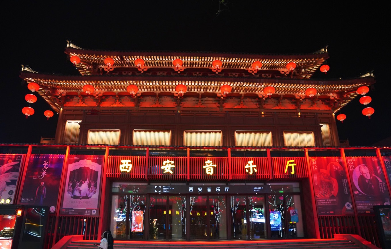 Lanterns and decorations along the street at night