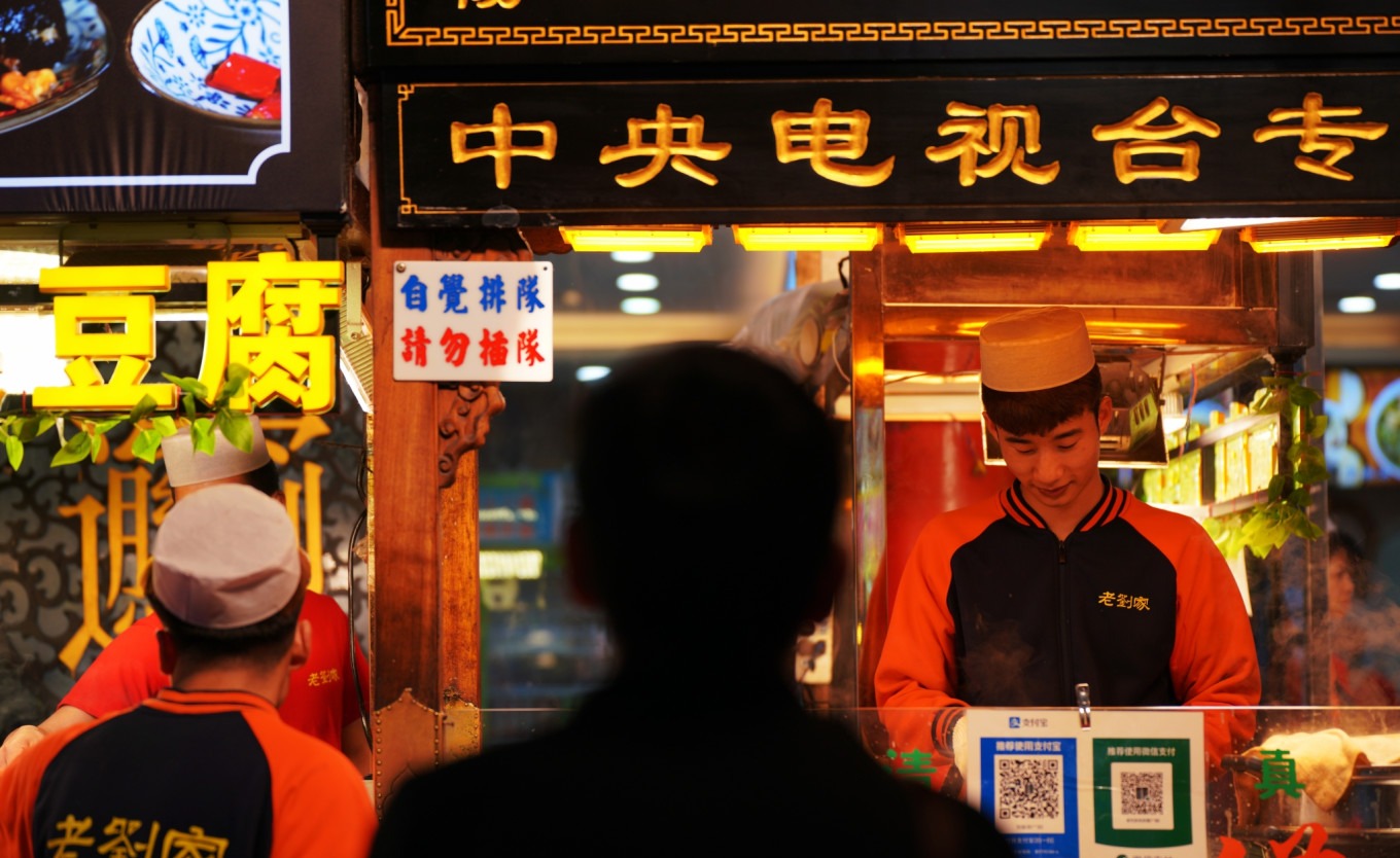 Colorful candied fruits and traditional sweets on display