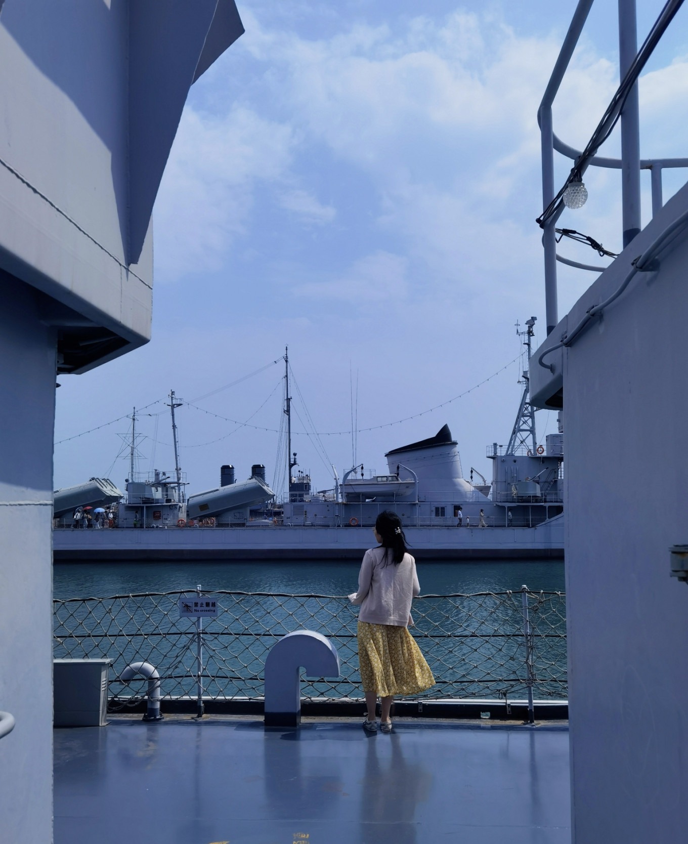 View from the deck of a warship overlooking the museum's maritime area