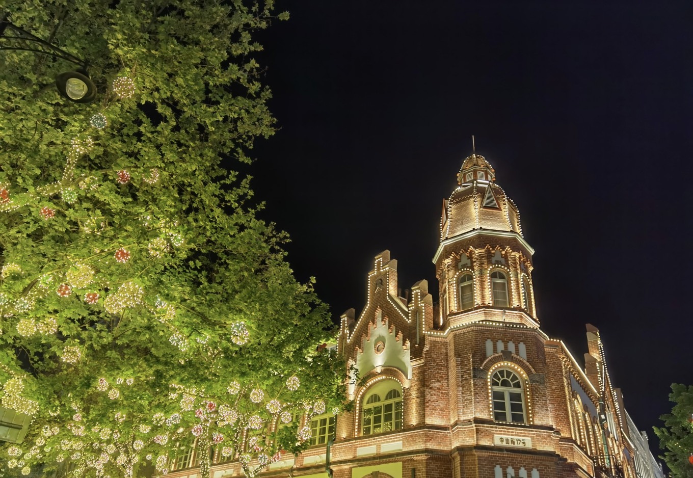Evening view of Zhongshan Pedestrian Street with St. Michael's Cathedral in the background