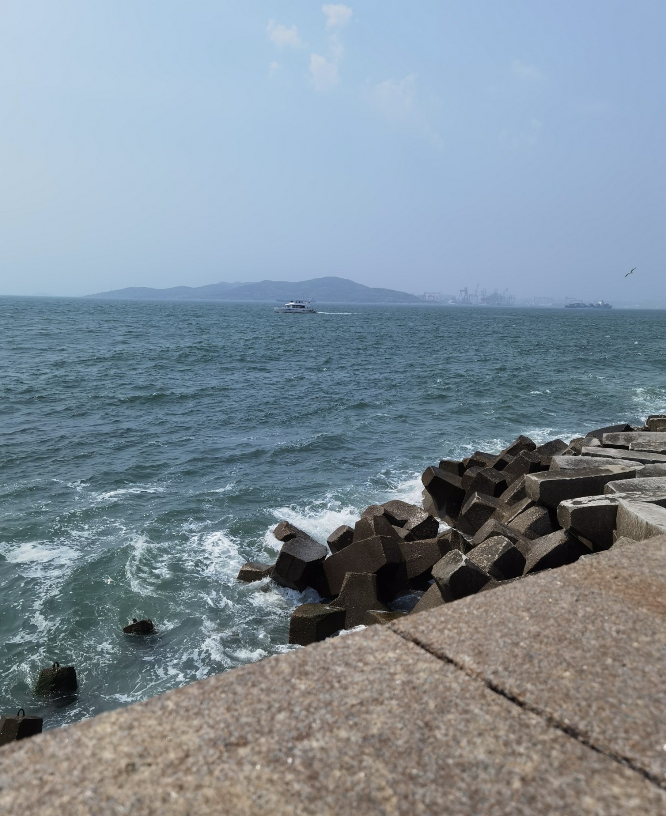 Waves crashing against the Piano Keys seawall at Badaxia