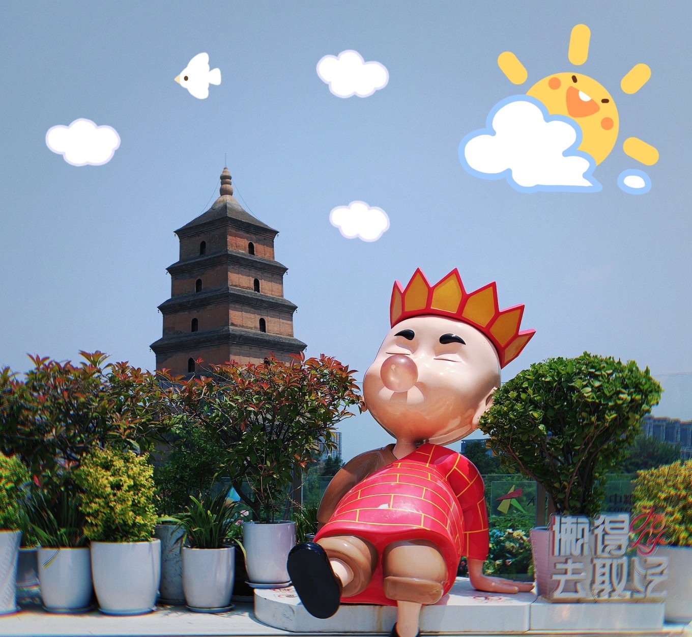 Giant Wild Goose Pagoda with Xuanzang statue in foreground