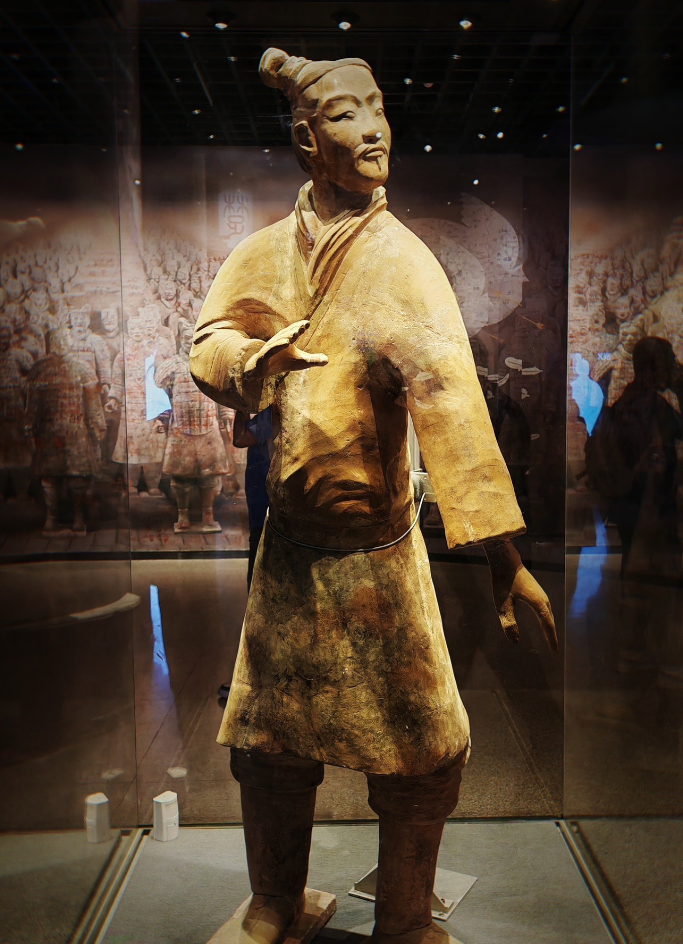 Terracotta warrior head showing detailed hairstyle and headgear