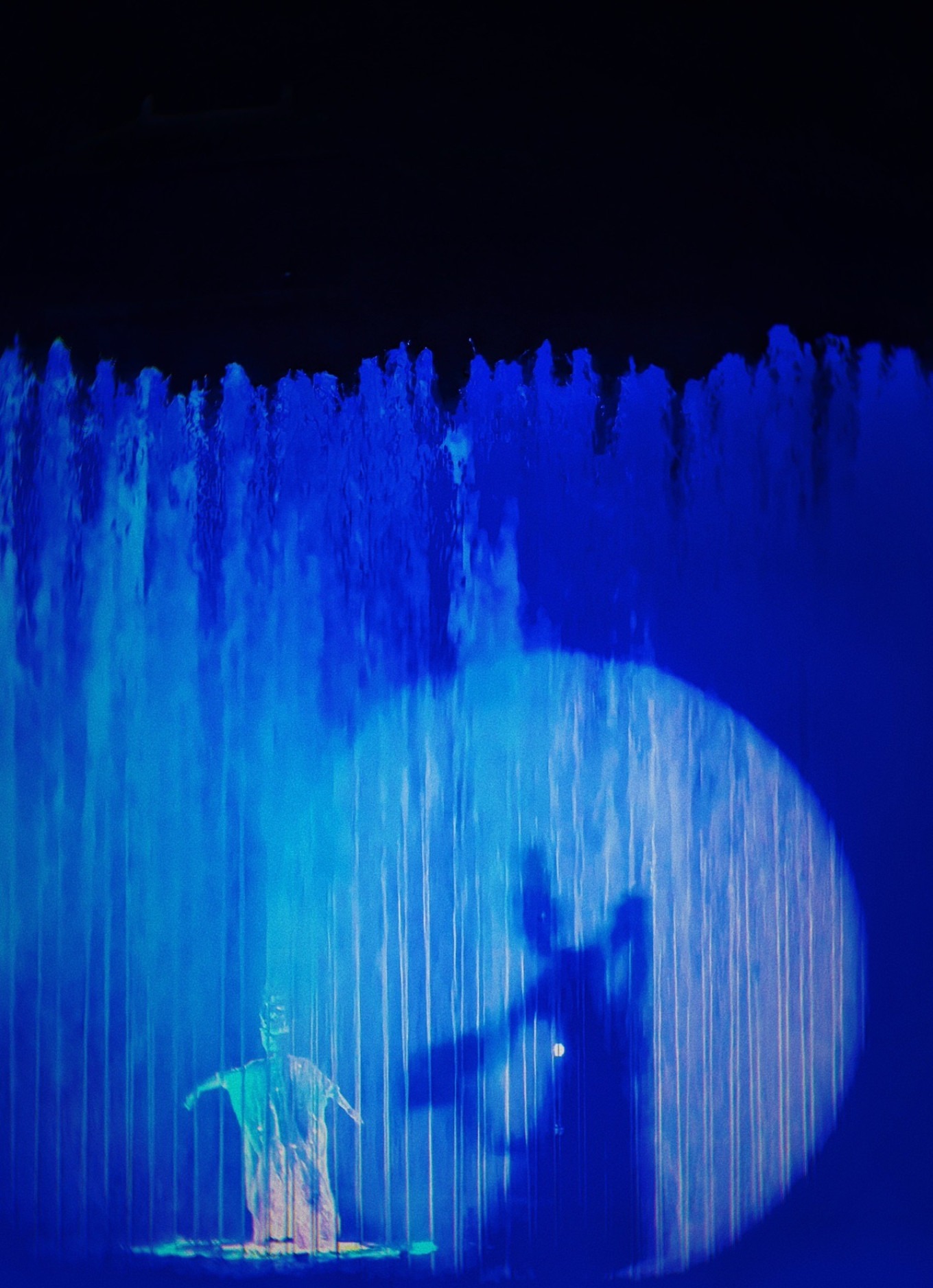 Dancers in Tang dynasty costumes performing on a water stage