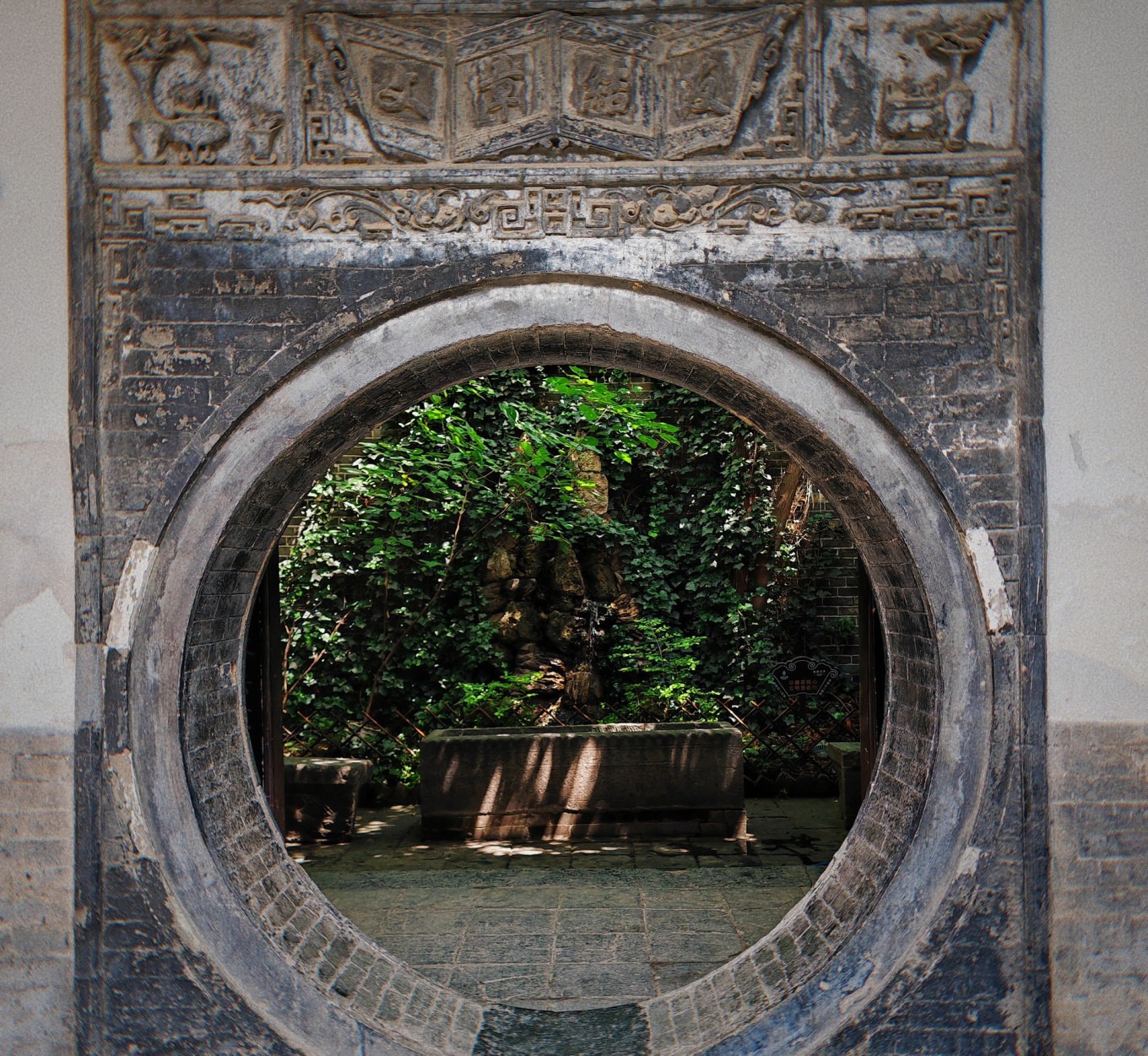 Courtyard interior with geese and traditional architecture