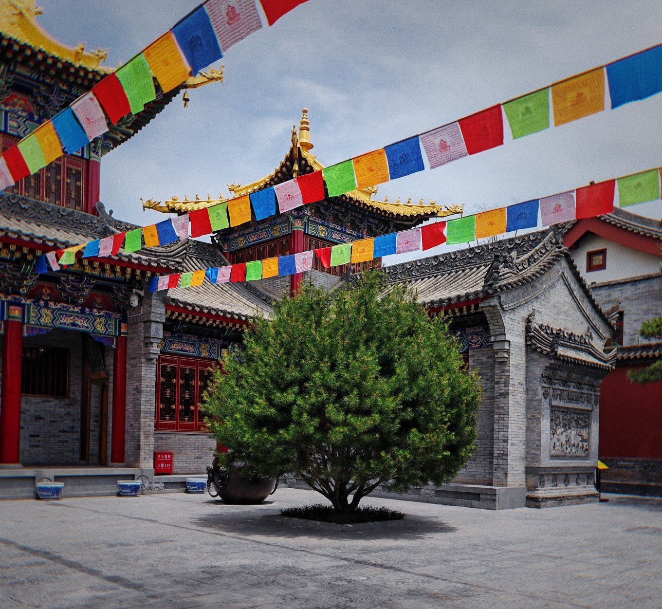 Temple courtyard with prayer flags
