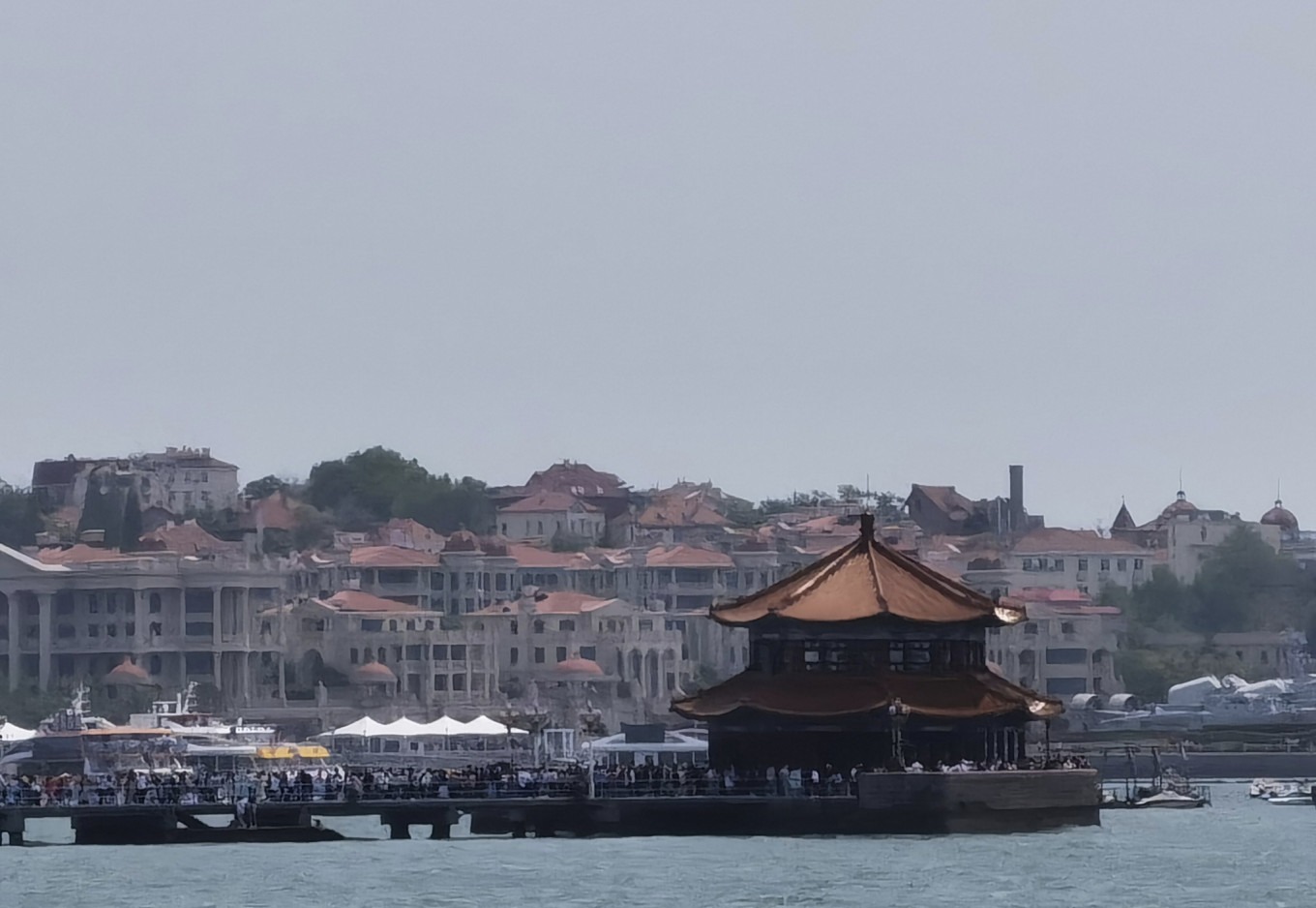 View from Xilingxia Three Road toward Zhanqiao Pier with a cloudy sky
