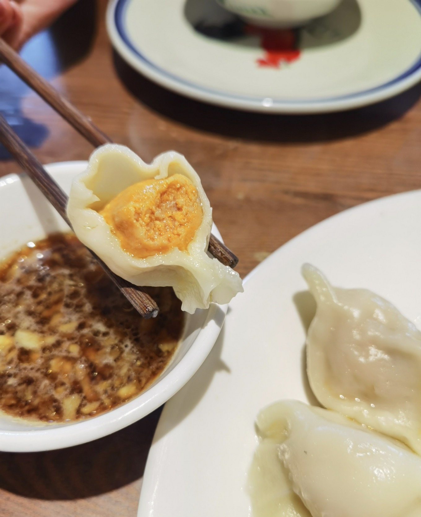 Plate of sea urchin dumplings at Haibo Restaurant in Qingdao