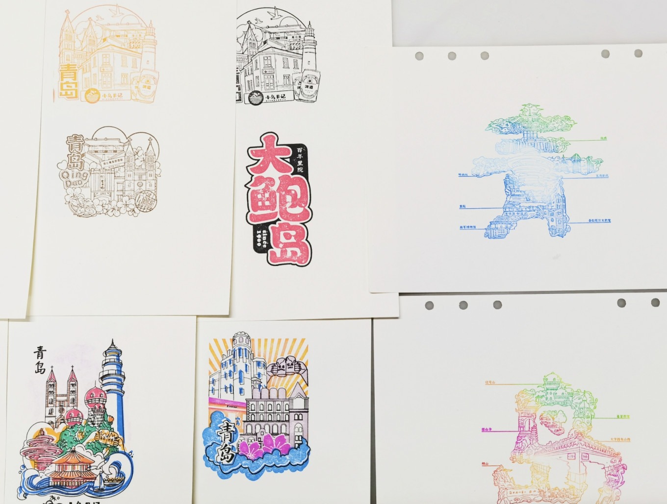Two stamps side by side: one with a sailboat, one with a pagoda