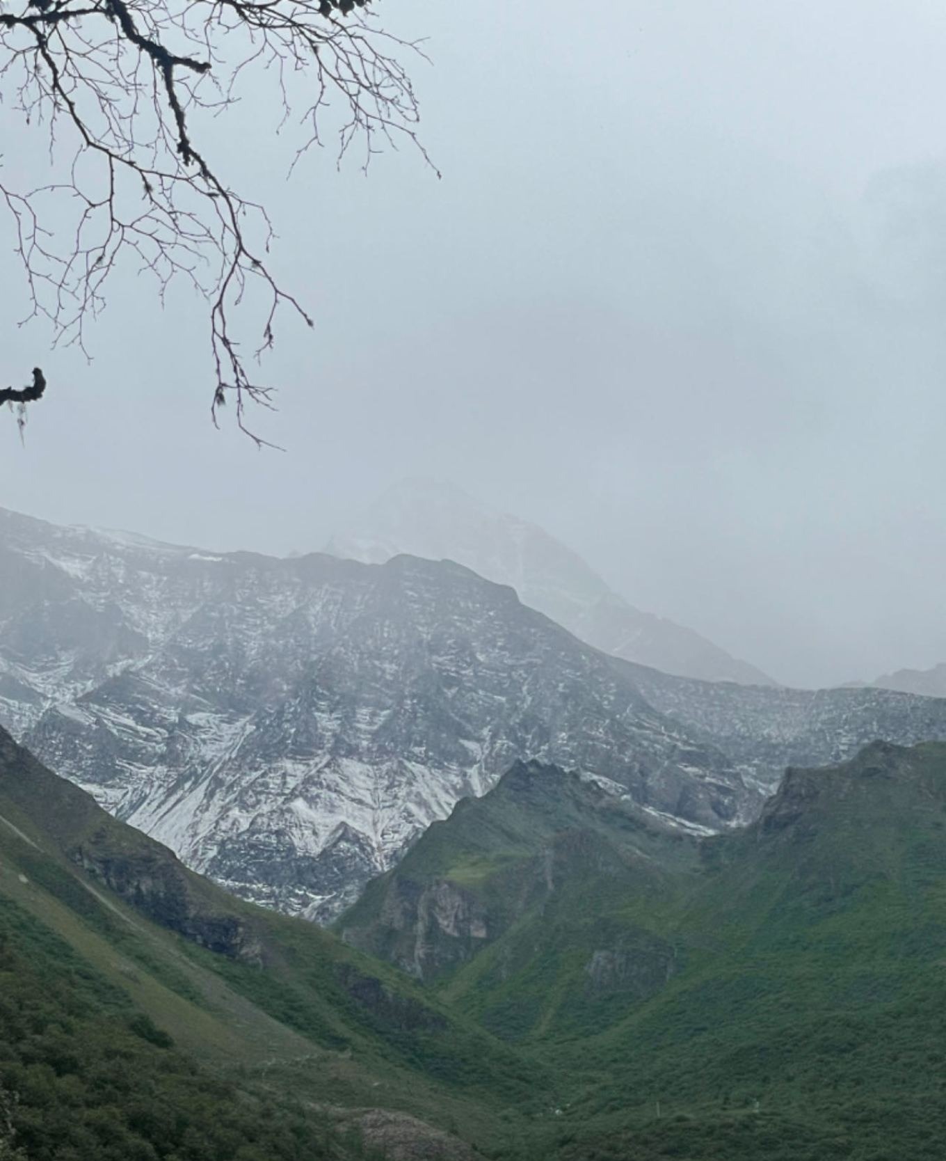 Road from Huanglong to Jiuzhaigou with rain clouds