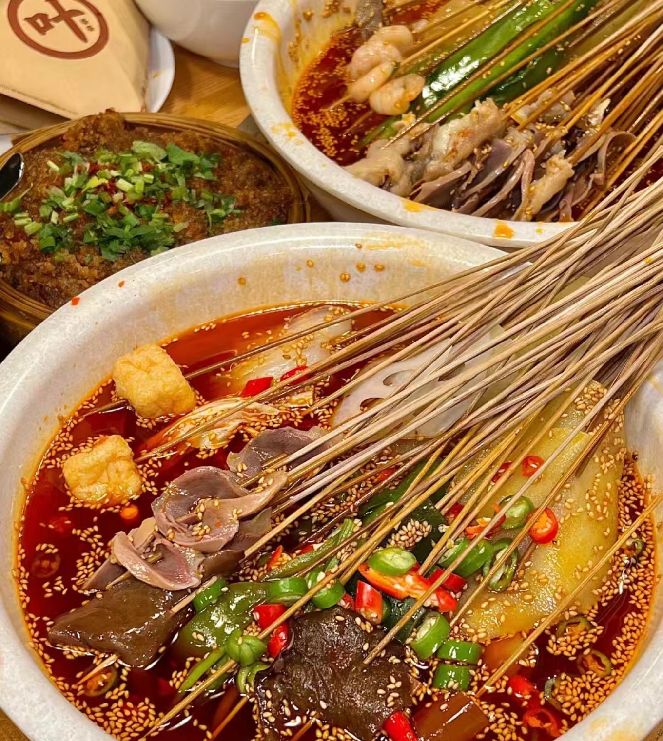 Bamboo skewers of Bo Bo Ji (cold skewers) in a spicy pot