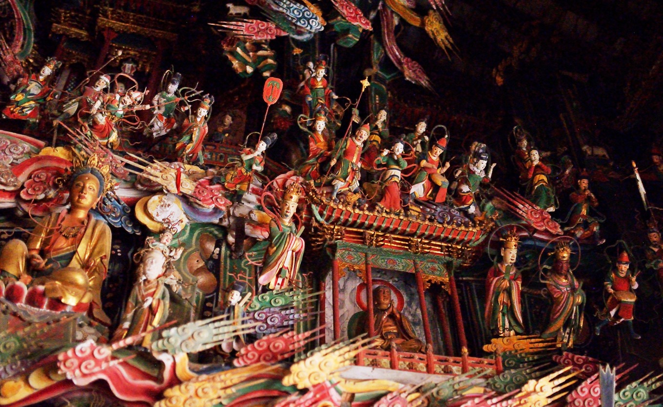 Taoist musician figures holding instruments