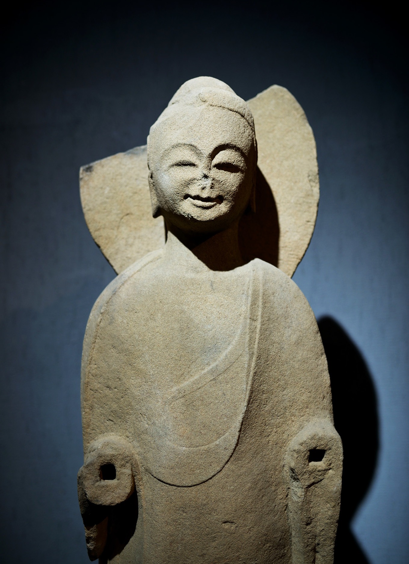 Buddha statue with a full, round face from a later period