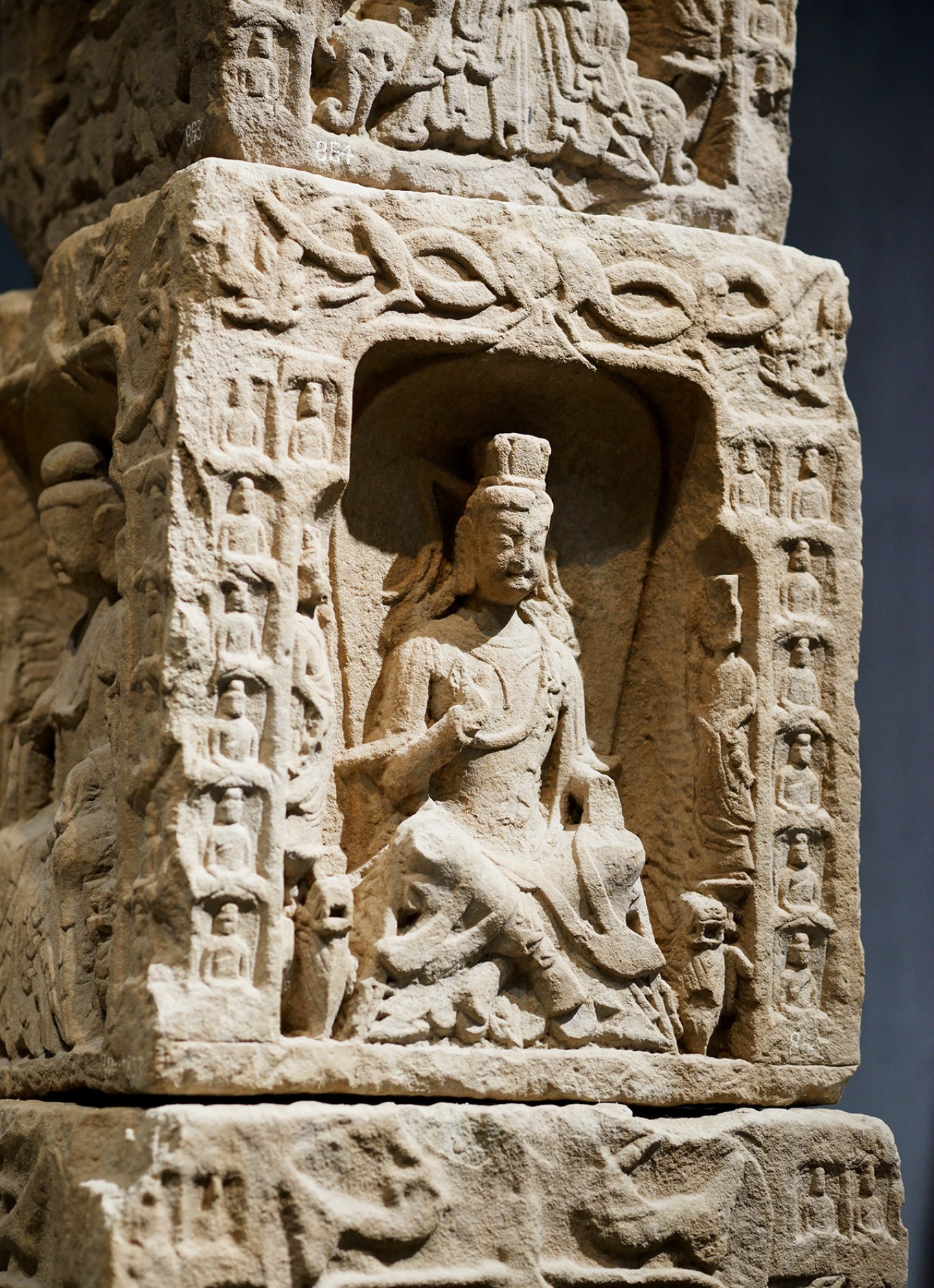 Buddha with a gentle smile and rounded face