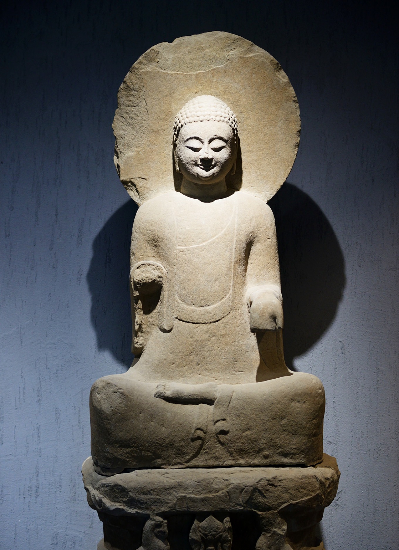 Bodhisattva statue with ornate headdress and flowing robes