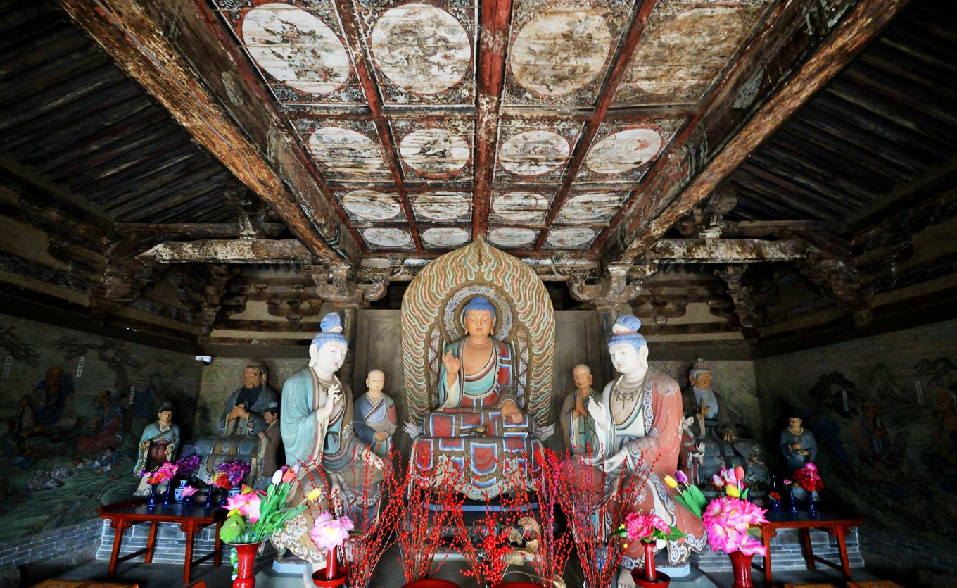 Painted sculptures inside the main hall, modern restorations