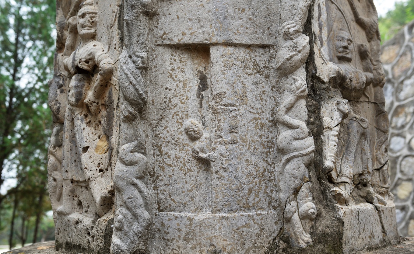 Pagoda detail of woman opening door motif