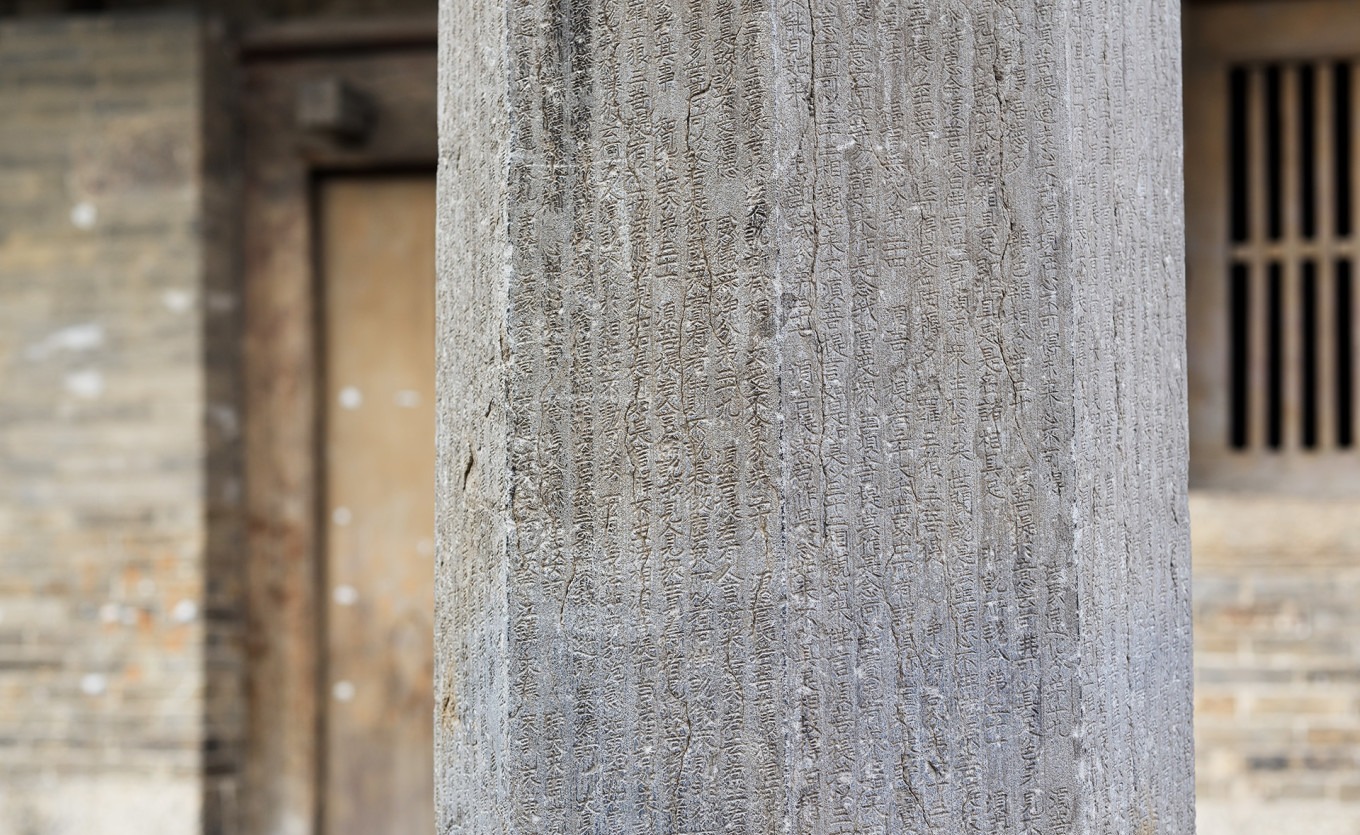 Another view of the stone dhvaja pillars at Chunhua Temple