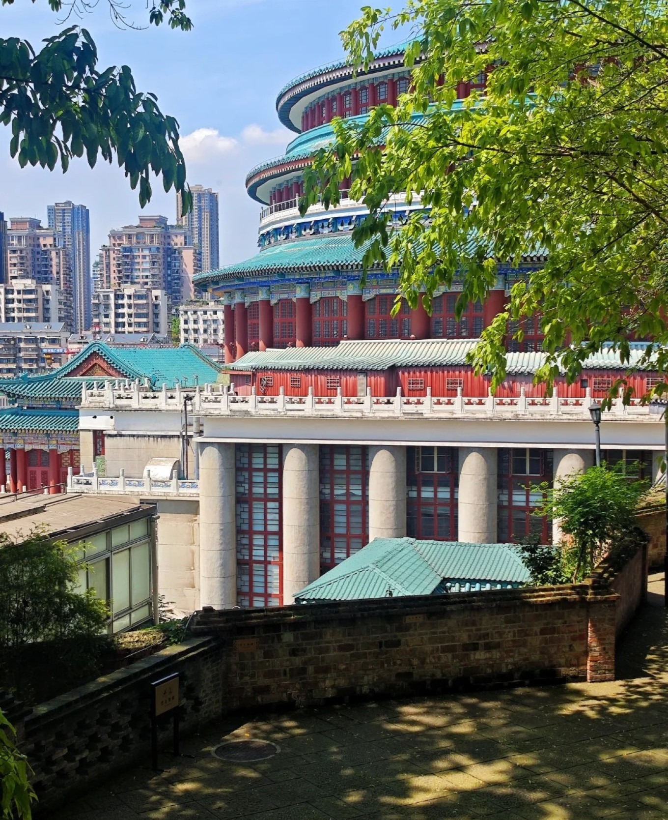 Close-up of the Great Hall's golden dome and symmetrical wings, inspired by Beijing's Temple of Heaven and Forbidden City