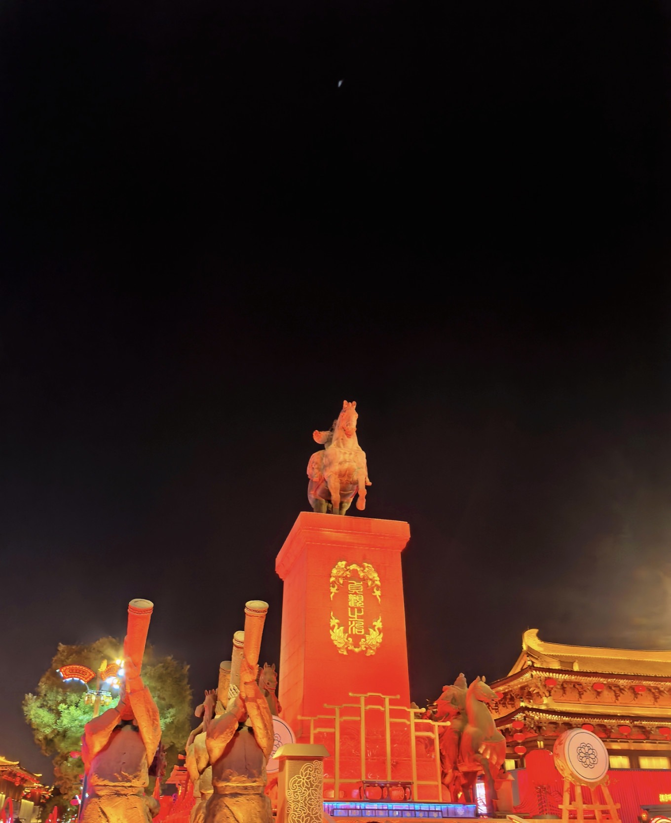 Zhenguan Square with cultural buildings at night