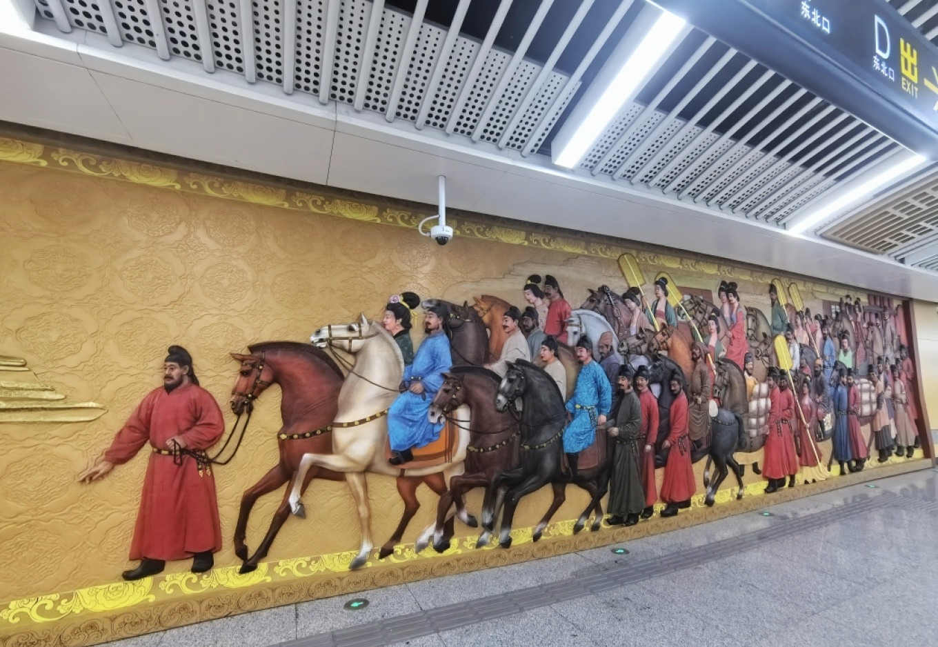Metro station art depicting Tang dynasty costumes near Xi'an Jiaotong University
