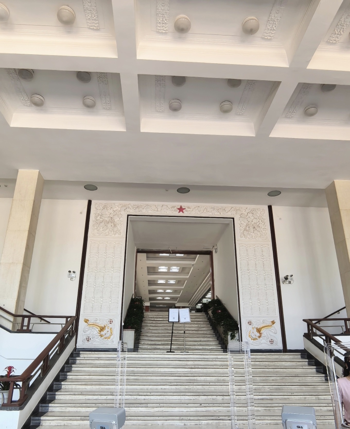 Exterior view of Qian Xuesen Library with students walking by