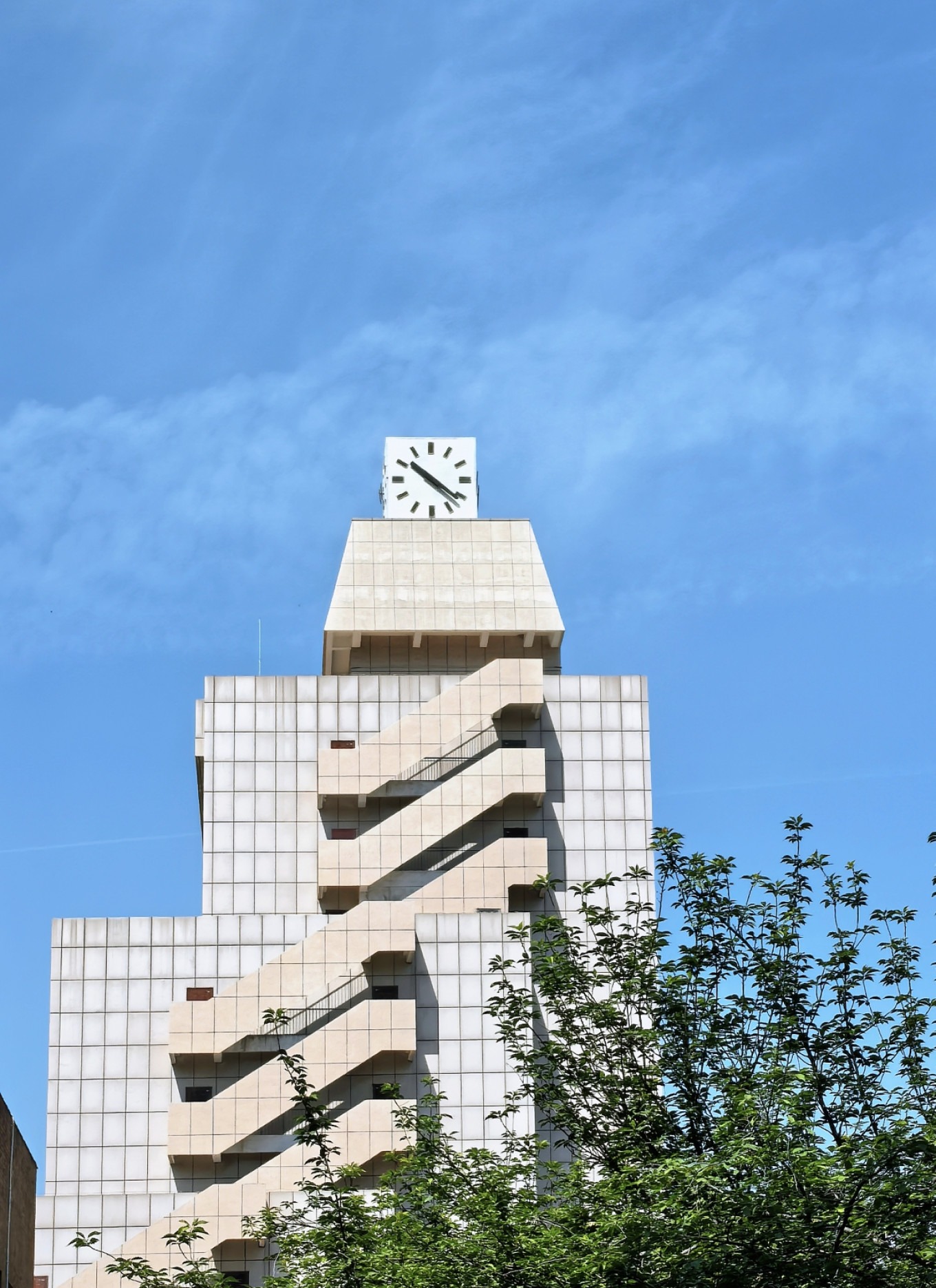 Clock tower against blue sky at XJTU