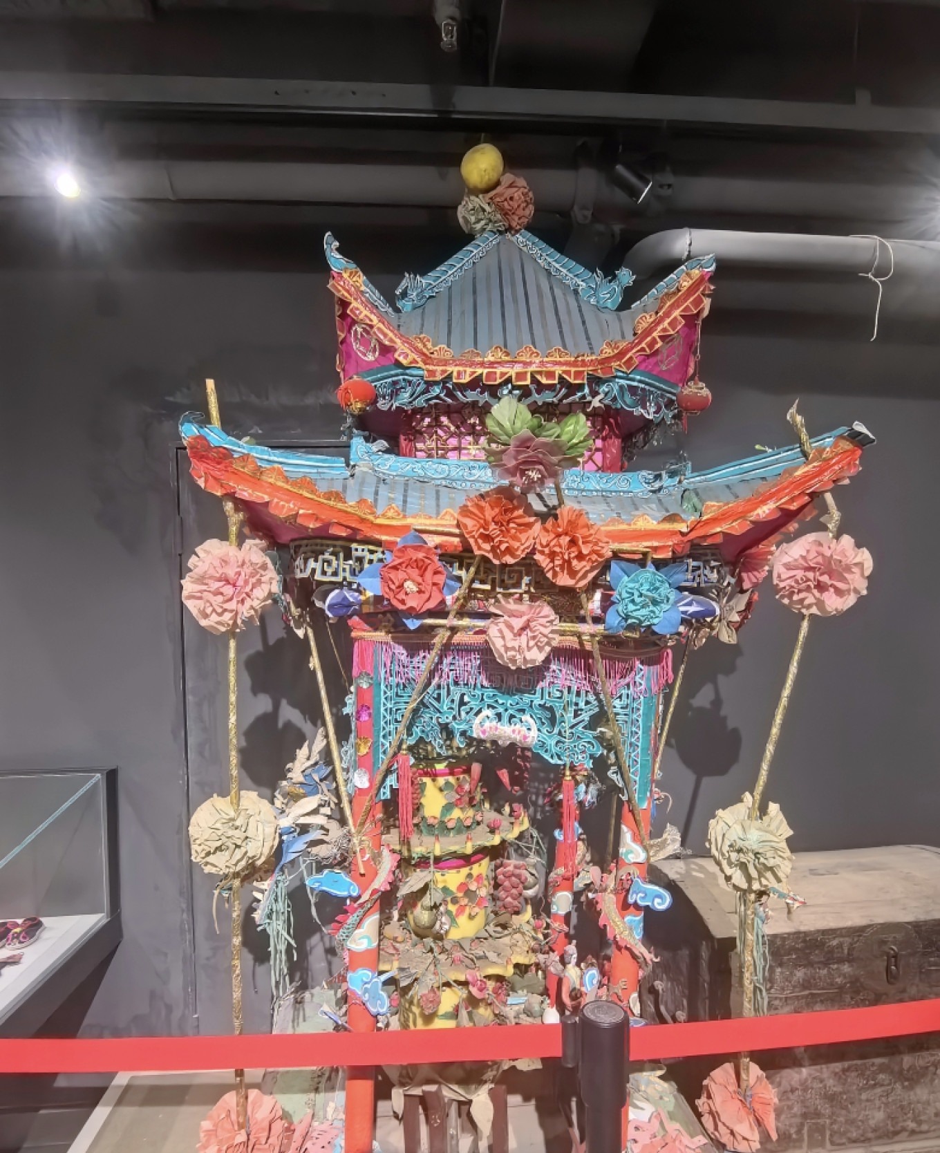 Doucun Big Candle exhibit showing its pagoda shape and colorful threads