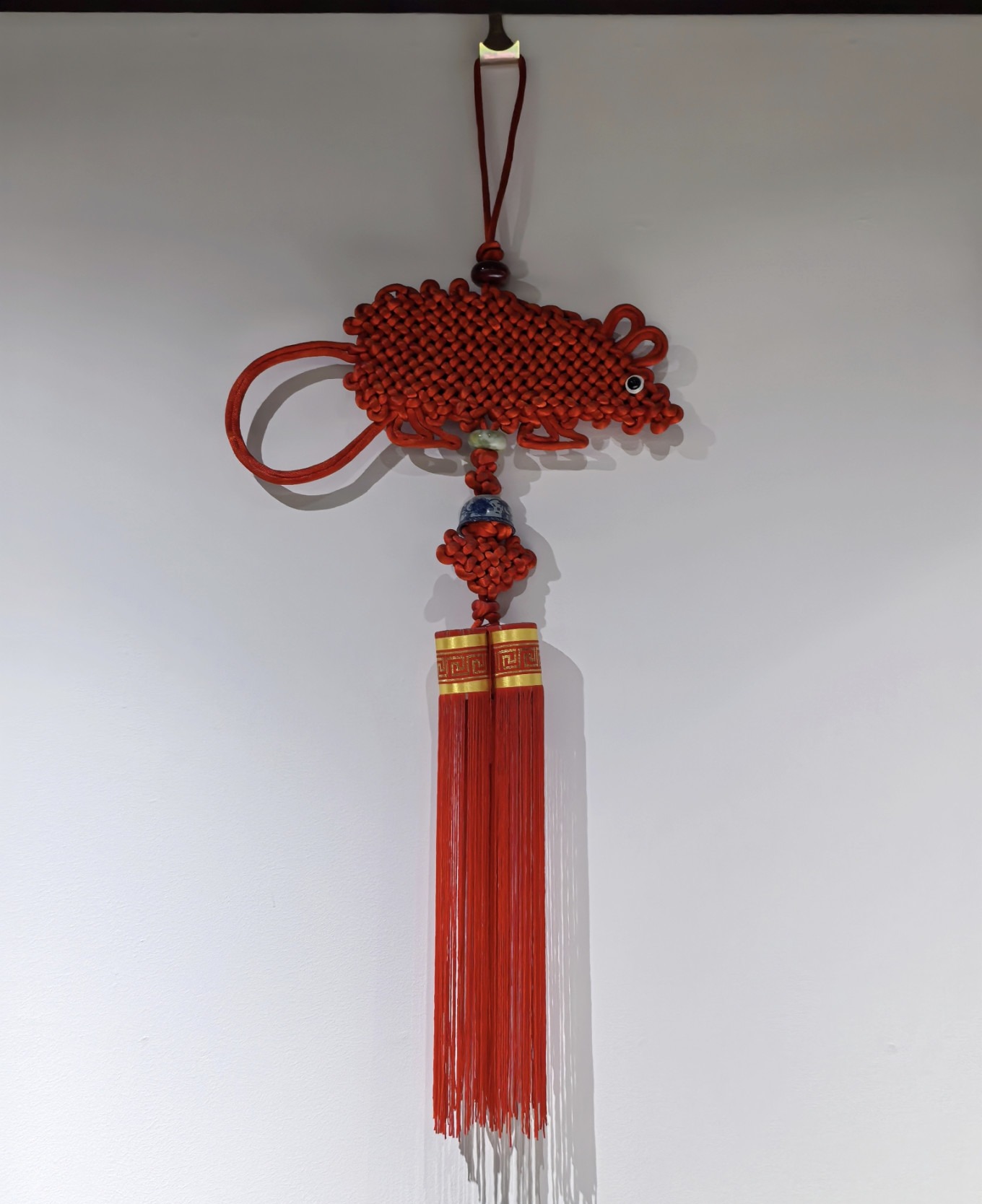 Various Chinese knot weavings on display