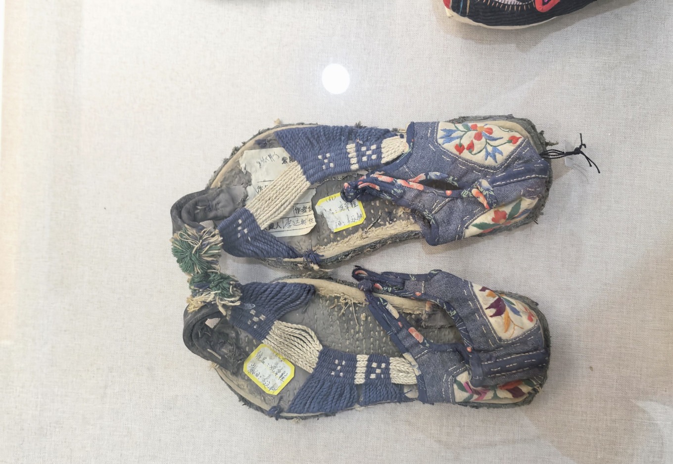 Traditional embroidered shoes on display